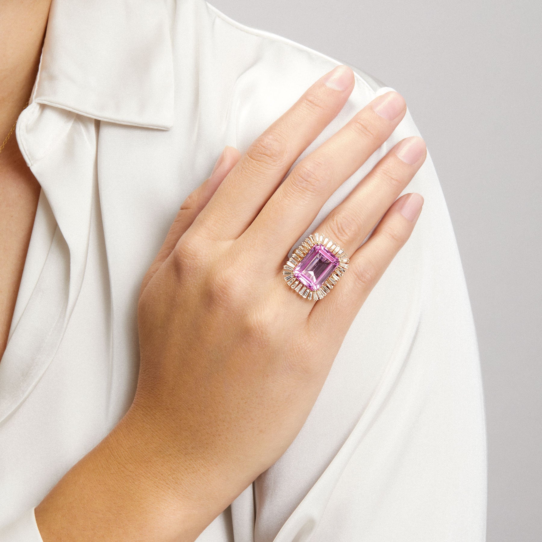 Model wearing 18KT Yellow Gold Pink Topaz Baguette Diamond Luxe Fauna Ring