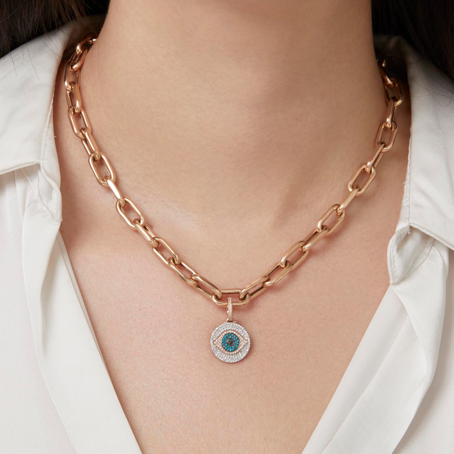 Model wearing 14KT Yellow Gold Blue Diamond Evil Eye Charm Pendant with Diamond Clip on Bail