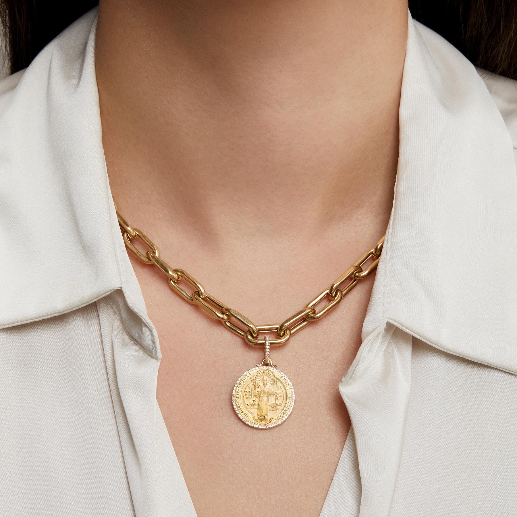 Model wearing 14KT Yellow Gold Diamond St. Benedict Medallion Charm with Diamond Clip on Bail