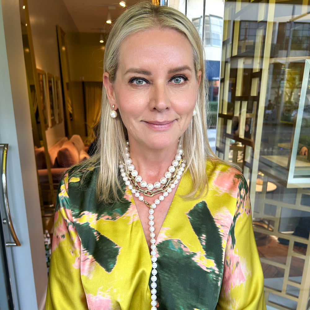 Anne Sisteron wearing White Shell Pearl Drop Earrings