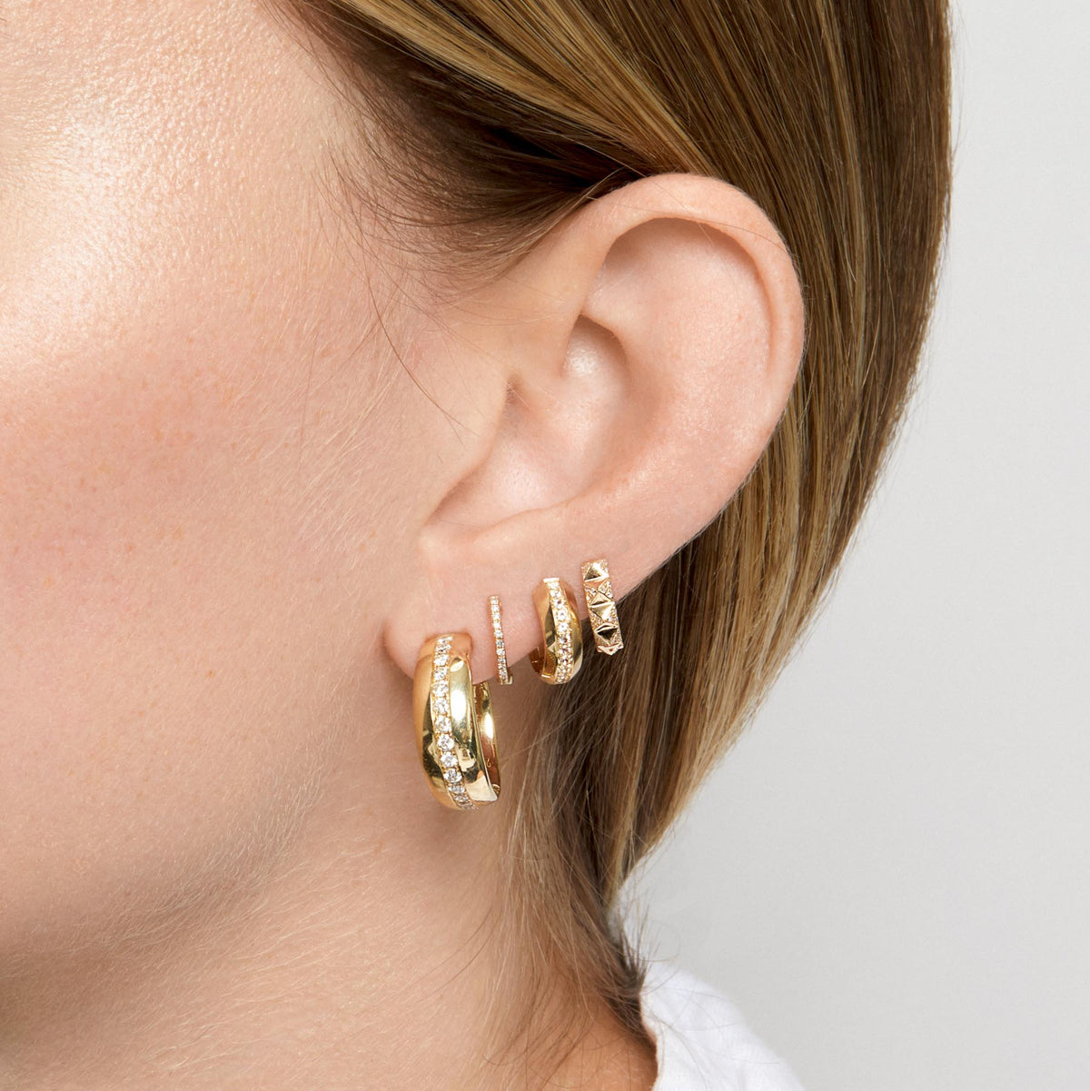 Model wearing 14KT Yellow Gold Diamond Madison Hoop Earrings