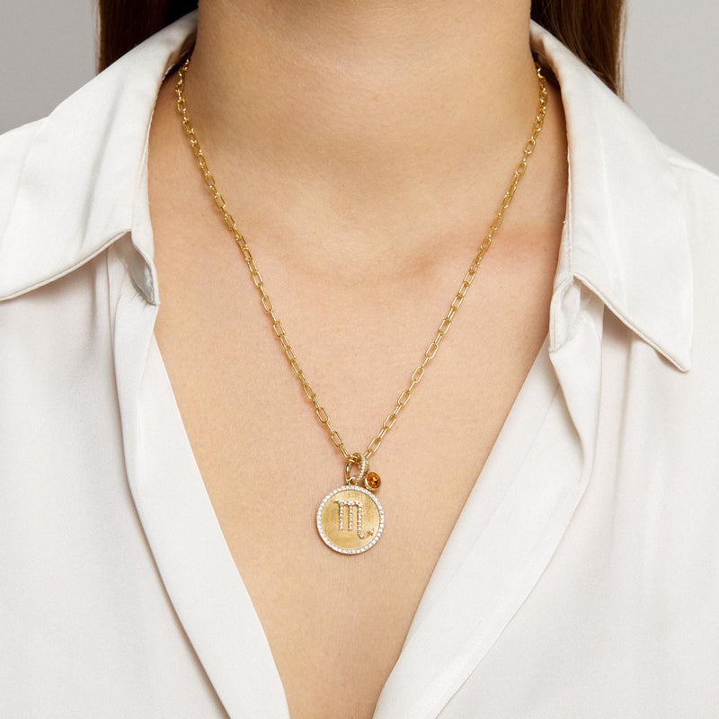 Model wearing 14KT Yellow Gold Diamond Zodiac Scorpio Medallion Charm with Diamond Clip on Bail