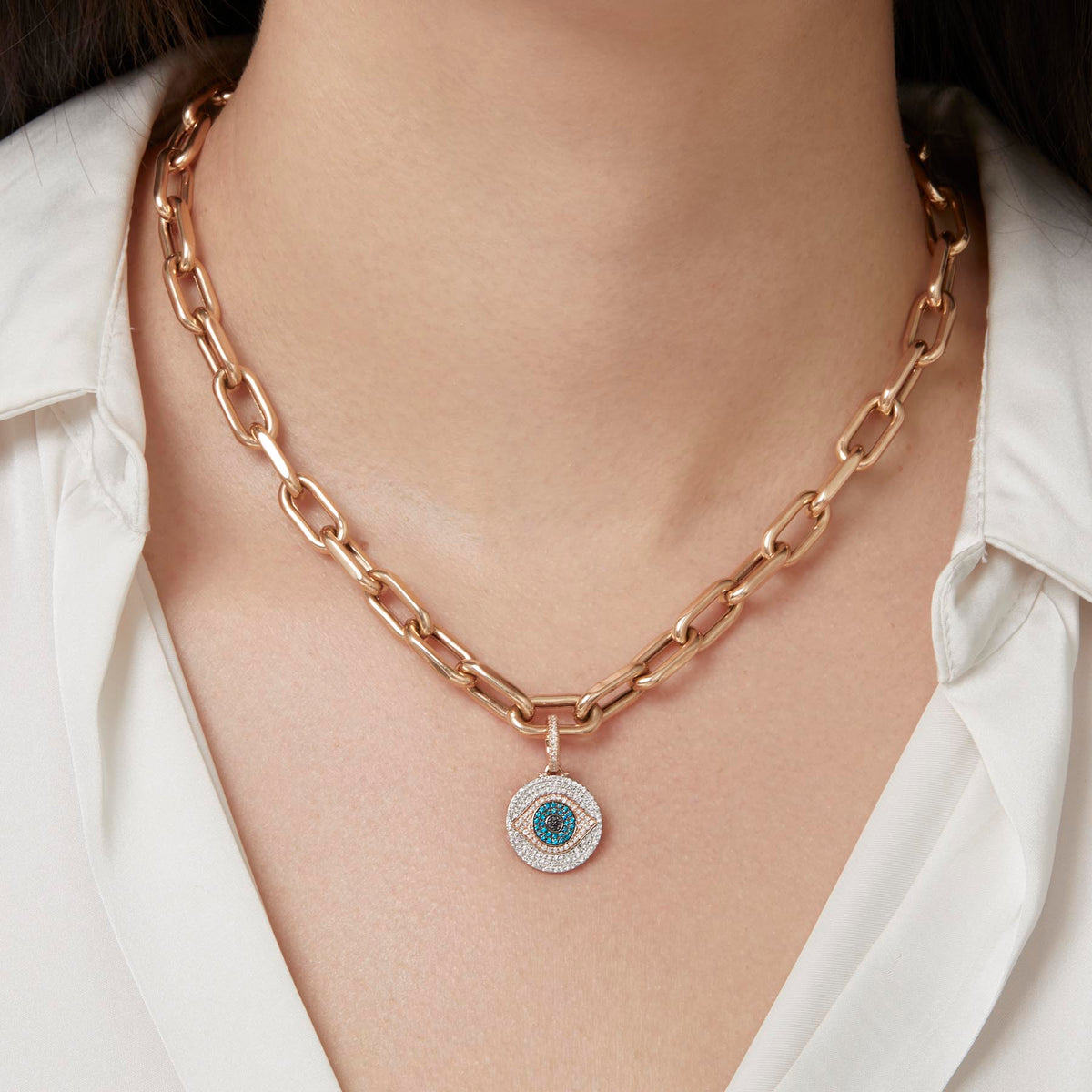 Model wearing 14KT Yellow Gold Blue Diamond Evil Eye Charm Pendant with Diamond Clip on Bail