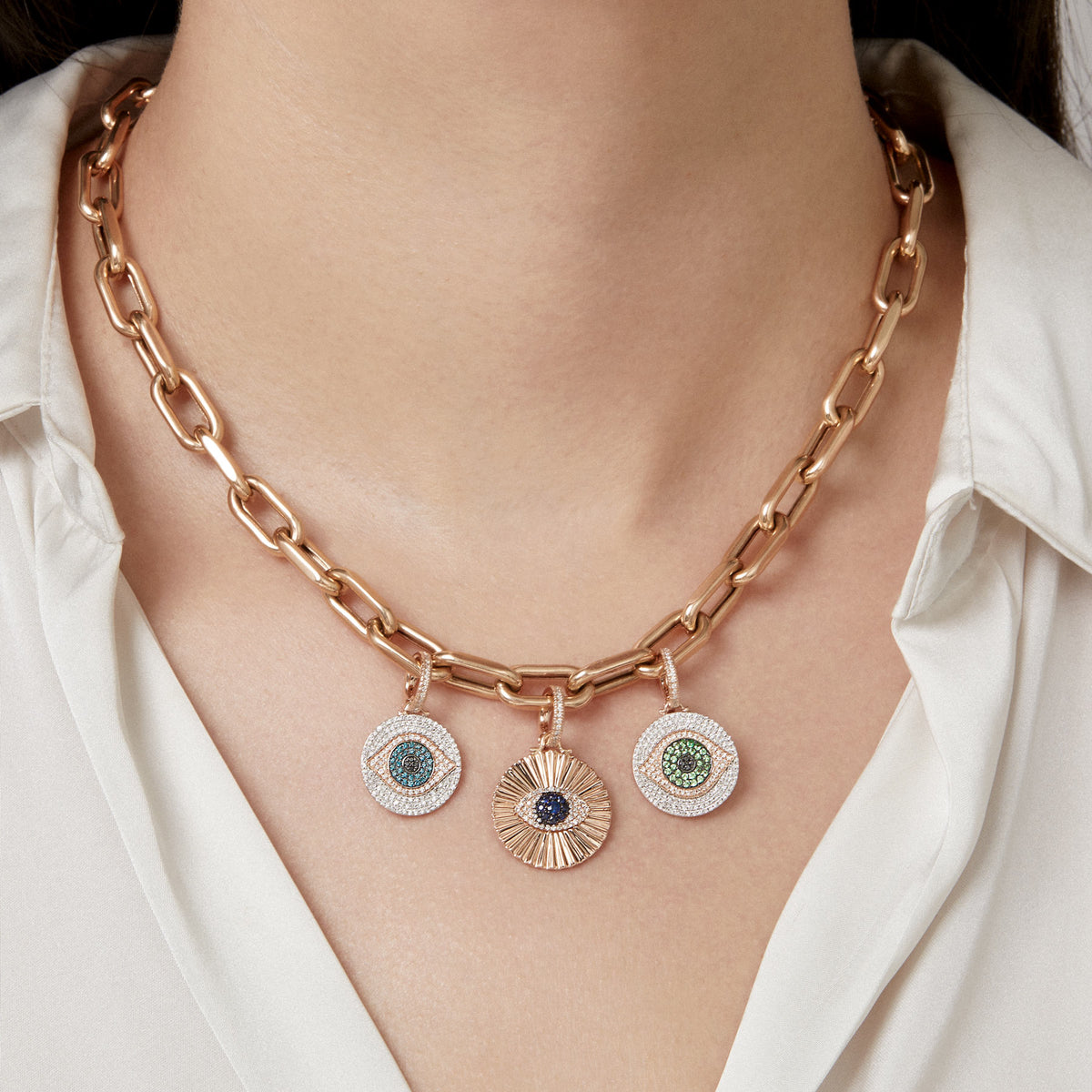 Model wearing 14KT Yellow Gold Blue Diamond Evil Eye Charm Pendant with Diamond Clip on Bail