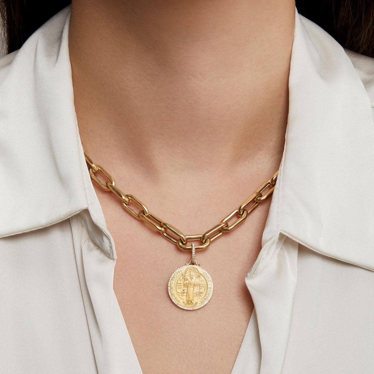 Model wearing 14KT Yellow Gold Diamond St. Benedict Medallion Charm with Diamond Clip on Bail