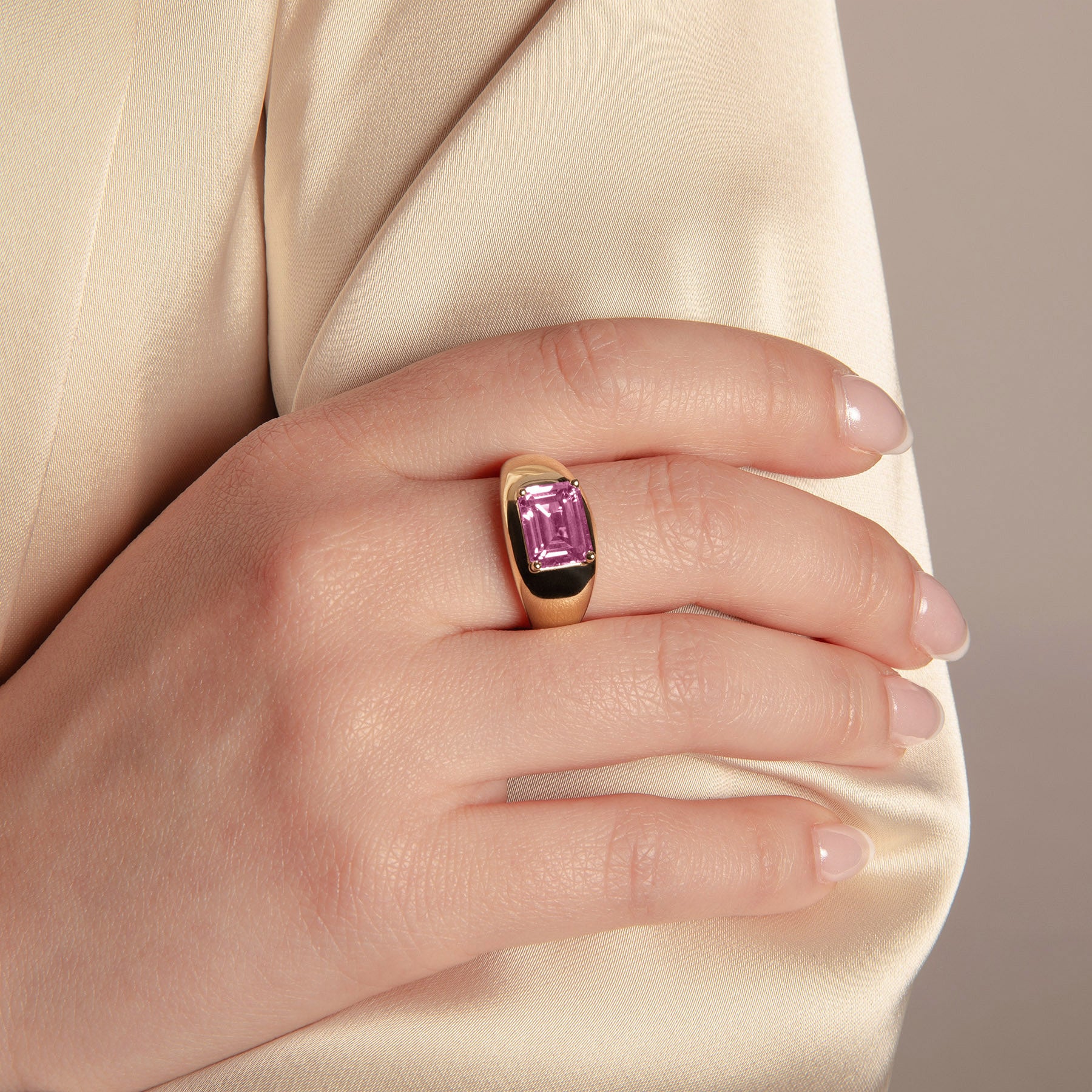 Model wearing 14KT Yellow Gold Pink Topaz Paloma Aperitif Ring