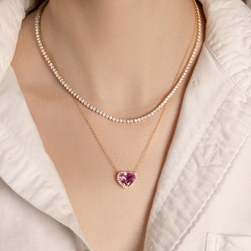 Model wearing 14KT Yellow Gold Pink Topaz Diamond Heart Necklace