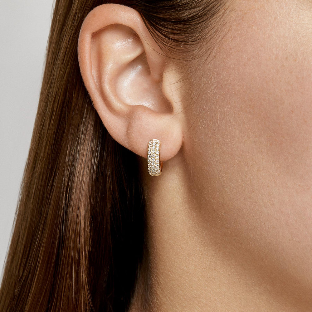 Model wearing 18KT Yellow Gold Diamond Luxe Brooklyn Huggie Earrings