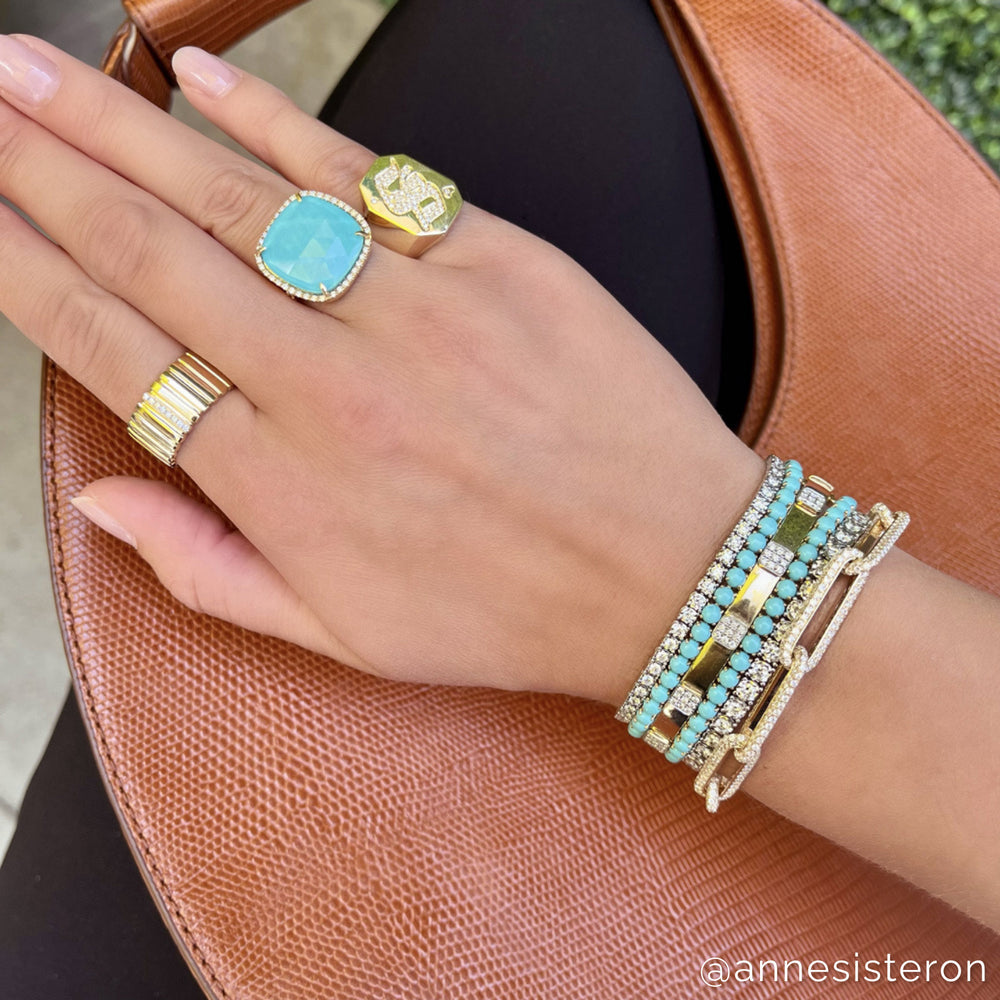 Model wearing 14KT Yellow Gold Diamond Turquoise Doublet Cushion Cut Cocktail Ring